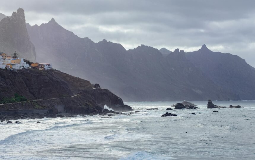 Discover the stunning cliffs and ocean waves along Tenerife's coastline in Spain.